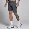 MP Hybrid Pocket Half Tight för män - Mörkgrå/Grön
